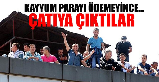 Ücret alamayan madencilerden çatıda eylem