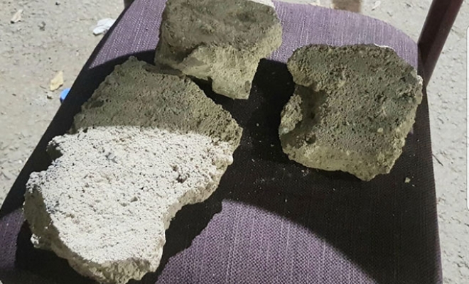 Havadan taş yağdı: 2 kişi yaralandı