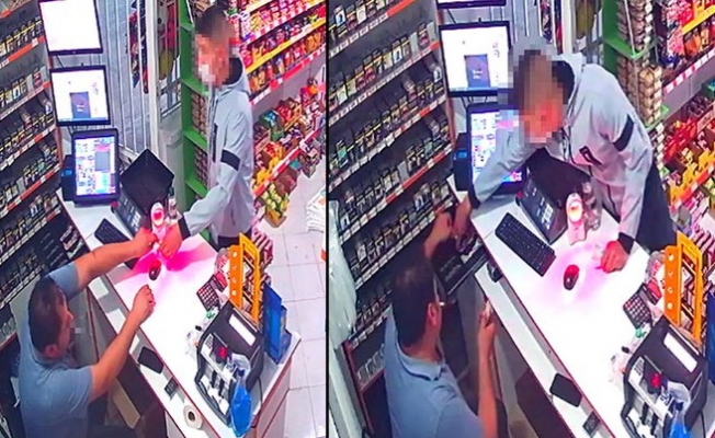 Babasının marketini silah zoruyla soydu!