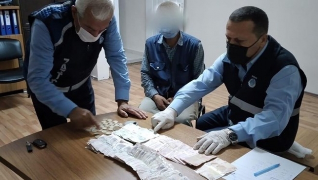 Dilenciden çıkan para şaşırttı
