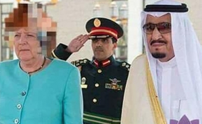 Suudiler Merkel'in saçlarını böyle örttü