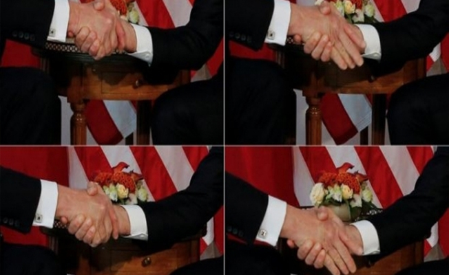 Macron ile Trump'ın el sıkışma savaşı