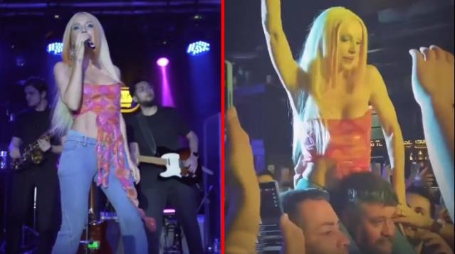 Gülşen görevlinin omzuna oturup şarkı söyledi