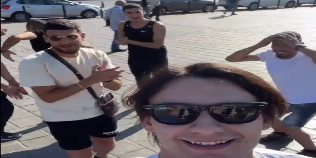 O da kadınları taciz eden yabancı uyrukluları telefona kaydetti: "Ben de onları çekiyorum!"