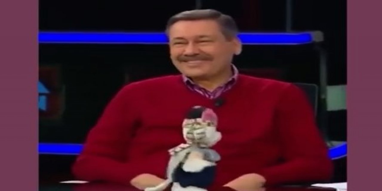 Melih Gökçek kedisini oynattı