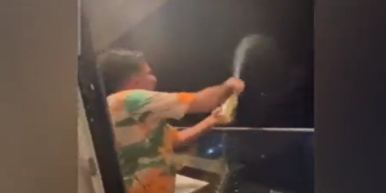 Sırıta sırıta 19. kattan milletin üzerine şampanya şişesi attı! O İranlı sınır dışı ediliyor