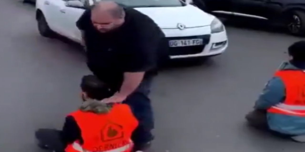 İklim aktivistlerini yolun ortasından kaldırıma çöp gibi fırlattı