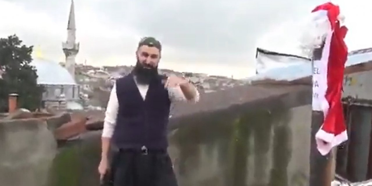 Dama çıkıp bacadaki Noel Baba'ya meydan okudu