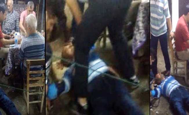 Kıraathanede fenalaştı, arkadaşları okey oynamaya devam etti!