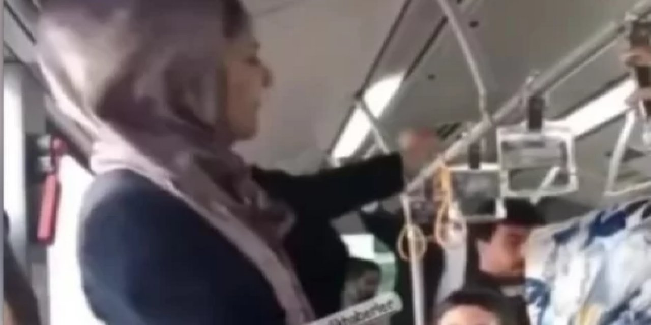 Metrobüsteki kadın bir anda ayağa kalkarak bağırmaya başladı:  "Recep Tayyip Erdoğan, Recep Tayyip Erdoğan..."