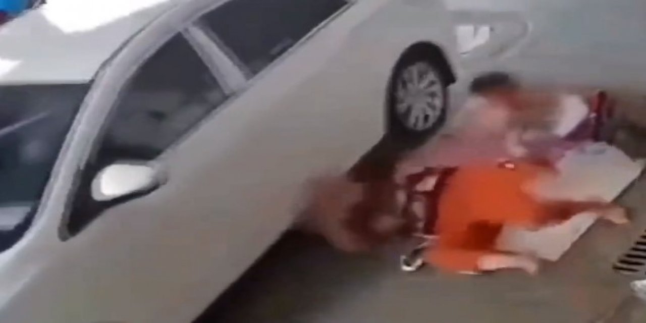 Arabasıyla yerde yatan kadınların üzerinden geçti