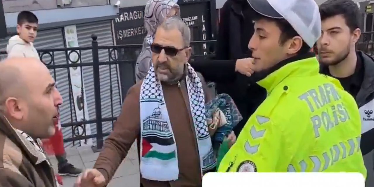 İstanbul'da hilafet bayrağı açan kişiye yumruk