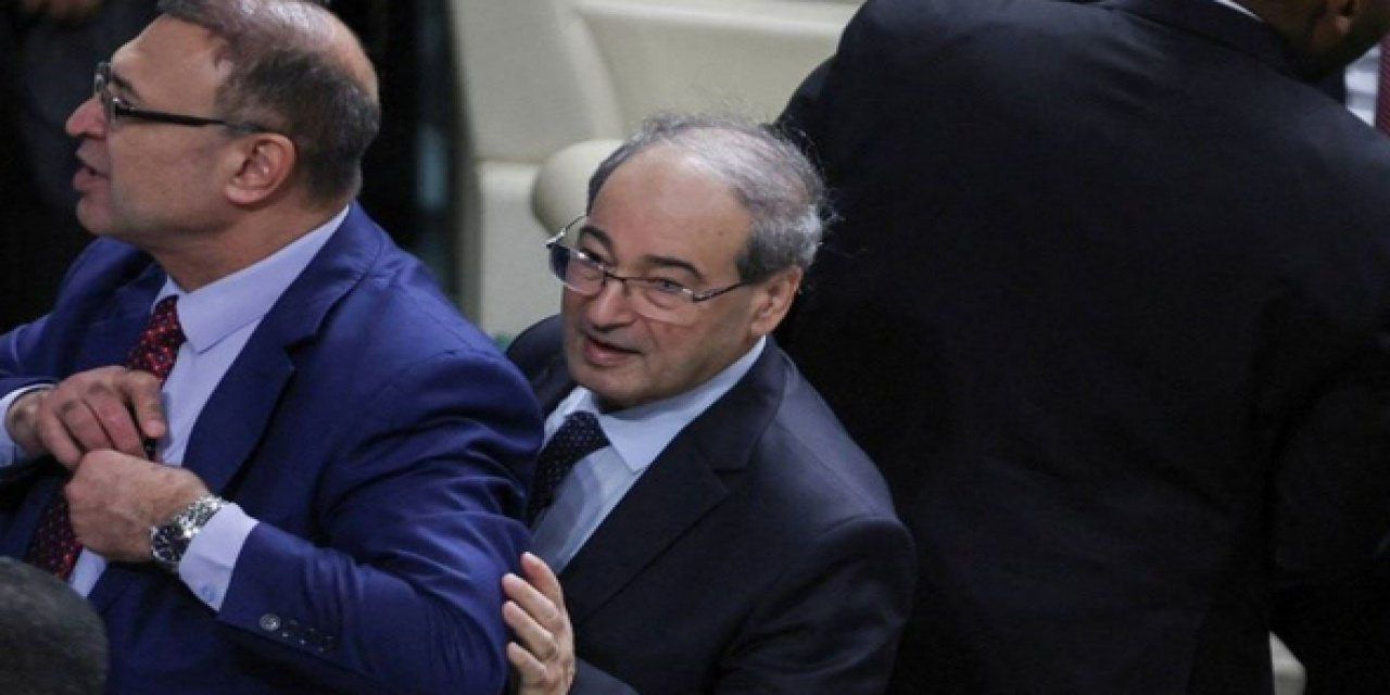 Hakan Fidan'ı protesto eden Suriyeli bakan, Esad'ın yardımcısı oldu