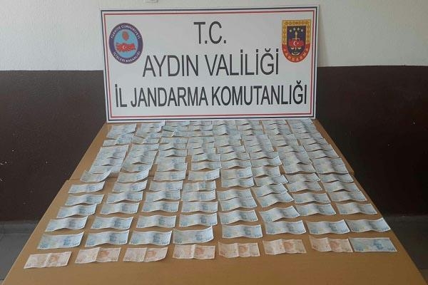 Evinde sahte paralarla yakalanıp, gözaltına alındı