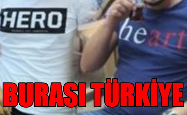 'Heart' yazılı tişört 'Hero' okununca gözaltına alındı