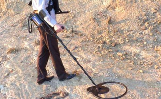 Polis memuru, kaçak define kazısı yaparken yakalandı
