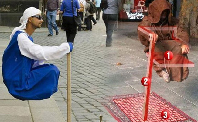 Havada oturan sokak sanatçısı sırrını açıkladı