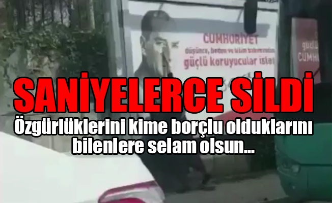 Başörtülü kadın Atatürk'ün resmini böyle sildi