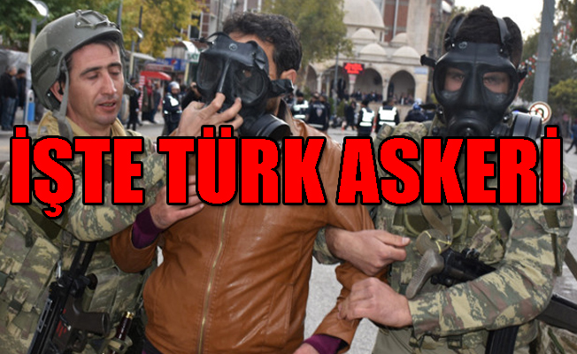 Asker eylemciye gaz maskesi verdi!