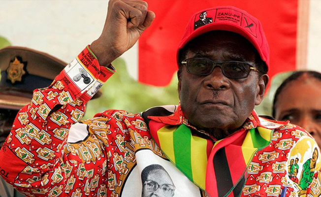 Mugabe koltuğunu bıraktı ama...