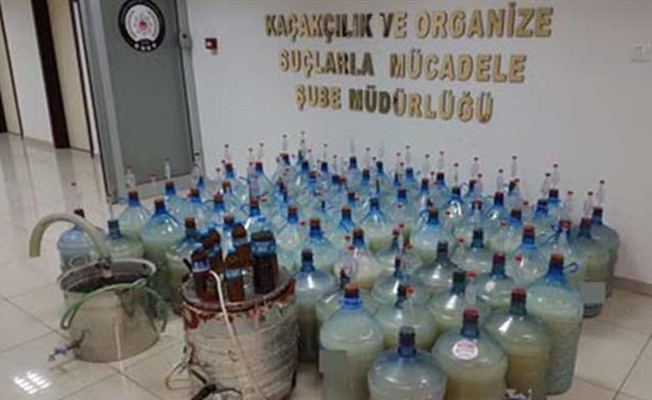Emekli öğretim görevlisi kaçak viski üretirken yakalandı