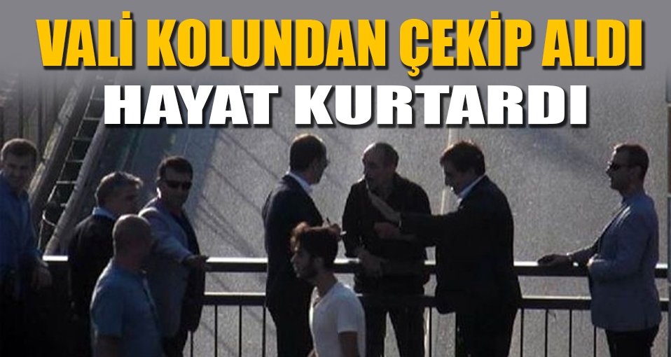Bursa Valisi köprüden atlamak isteyen adamı kolundan yakaladı