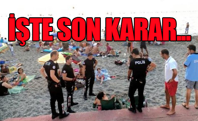 Plajda bira içen doktorlara para cezası kesilmişti...