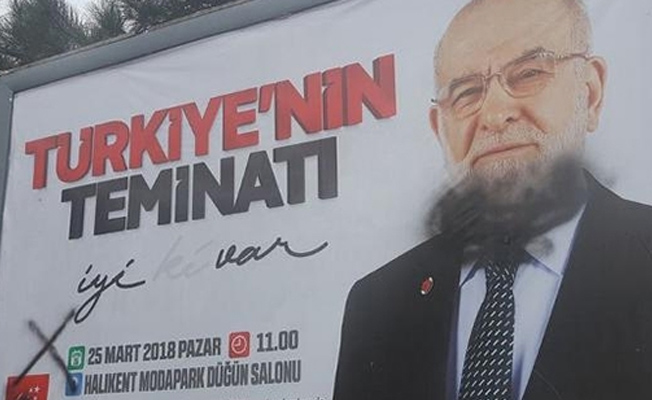 Temel Karamollaoğlu afişlerine saldırı
