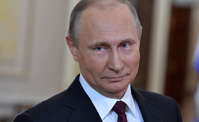 Time yeni sayısının kapağında Putin'i başında taçla gösterdi