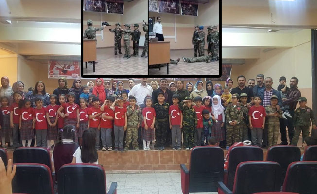 İlkokul öğrencilerinin eline silah verildi, temsili savaş gösterisi yapıldı