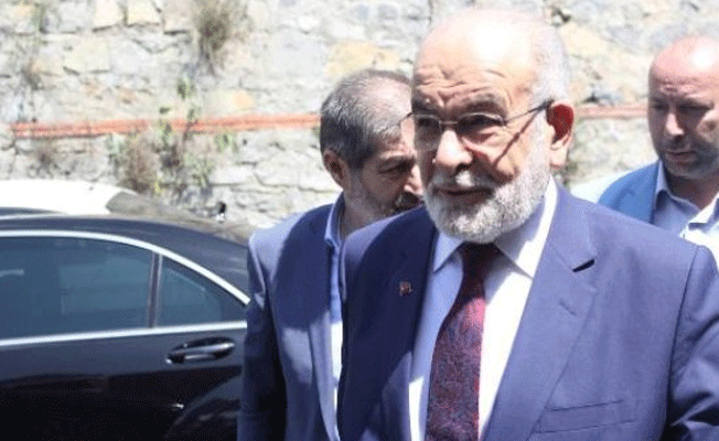 Karamollaoğlu'ndan Demirören ailesine taziye ziyareti