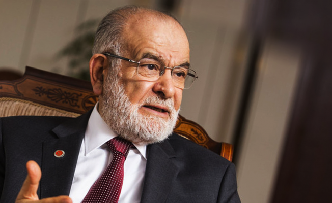 Karamollaoğlu'ndan tehdit edilen yazarlara destek