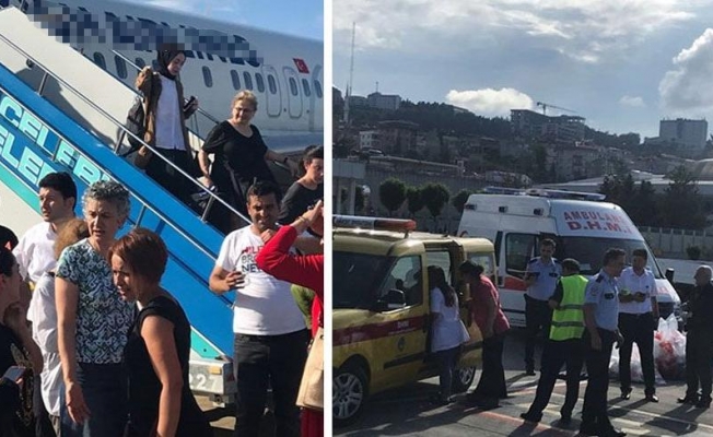Aprona ambulanslar girdi: Yolcu uçağında panik