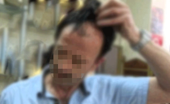 Kafasındaki perukla bakın cezaevine ne sokmaya çalıştı