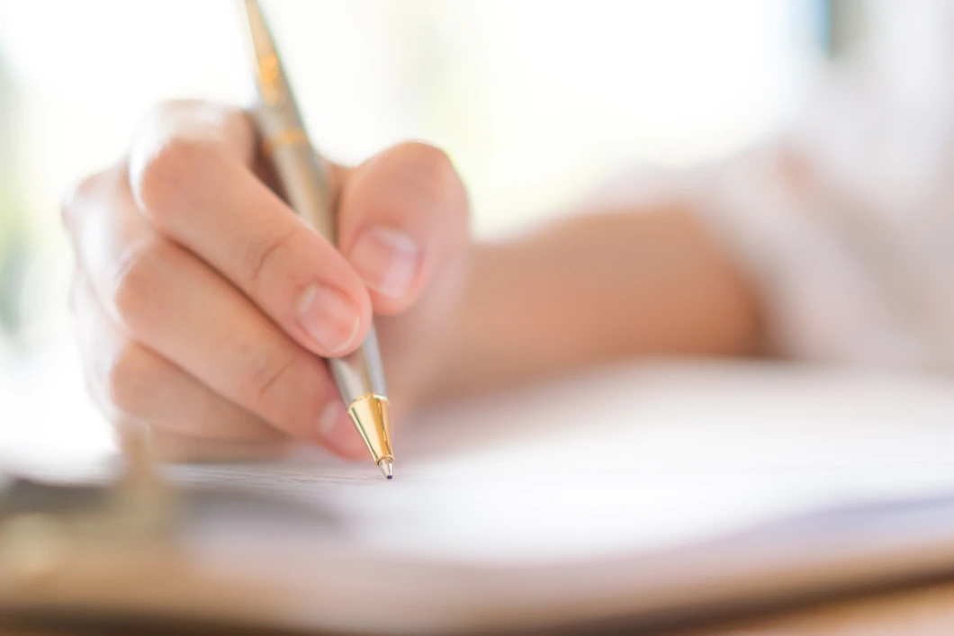hand-with-pen-application-form-1232-4916.webp