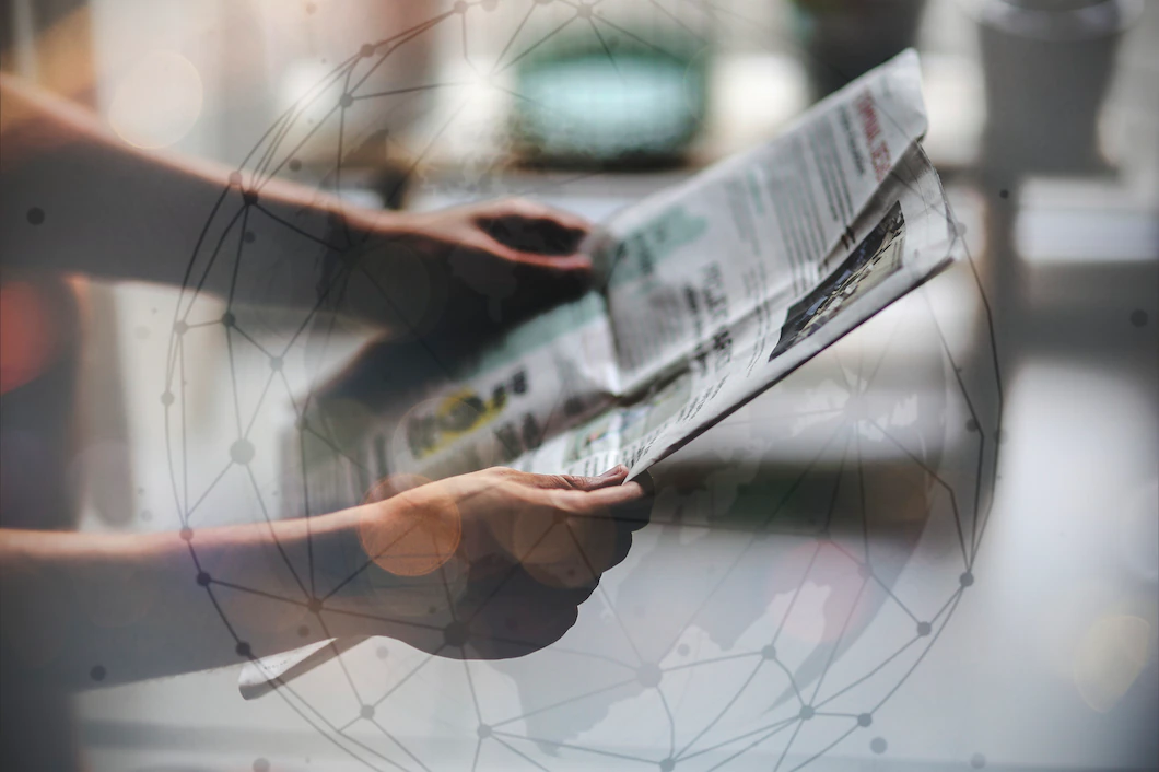 man-reading-newspaper-53876-89052.webp