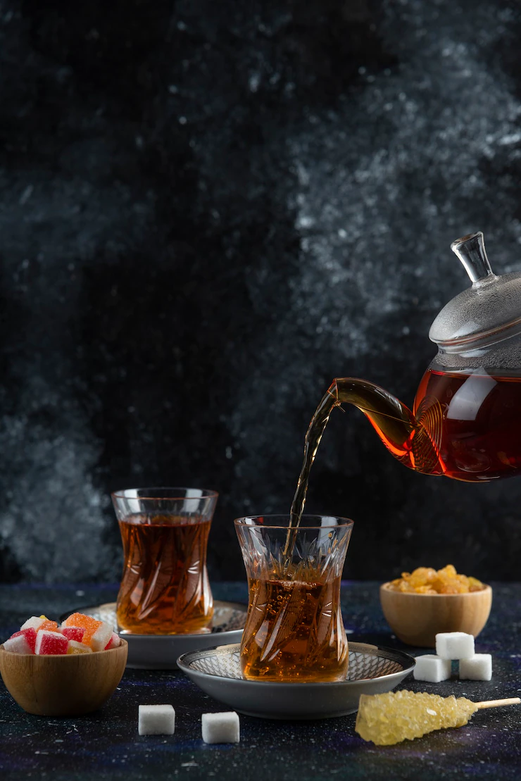 tea-with-delights-colorful-surface-114579-61553.webp