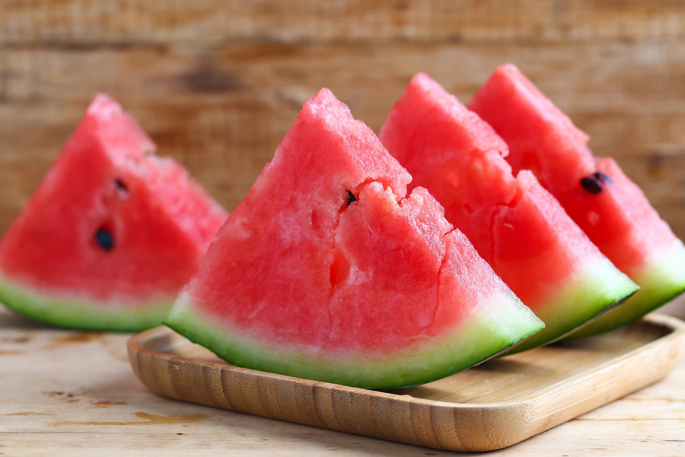 fresh-sliced-watermelon-wooden-background-1387-293.webp