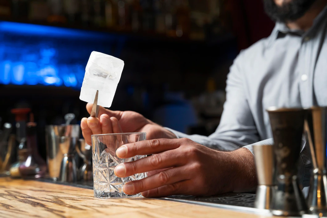 close-up-bartender-cocktail-shaker-23-2149132150.webp