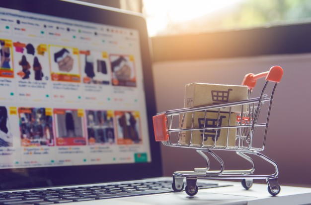 parcel-paper-cartons-with-shopping-cart-logo-trolley-laptop-keyboard-9635-3215.jpg