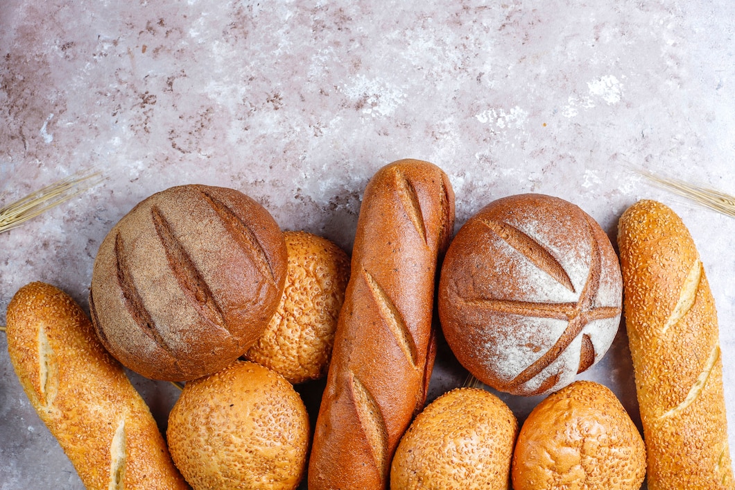 different-kinds-fresh-bread-as-background-top-view-114579-8025.jpg