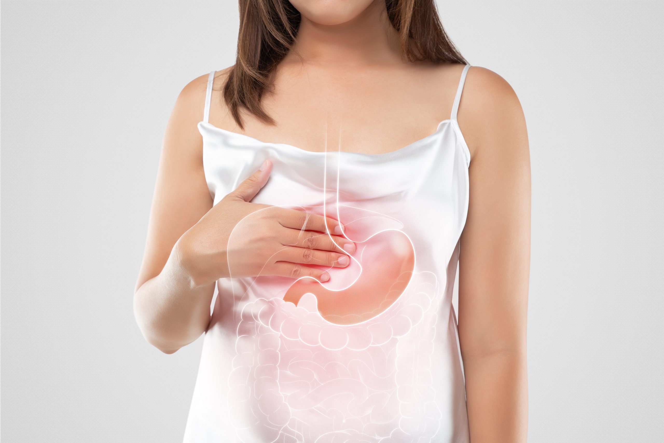 a-woman-suffering-from-gastroesophageal-reflux-dis-2021-08-30-12-32-44-utc-scaled.jpg