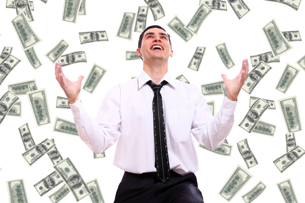 happy-businessman-flying-dollar-banknotes-144627-26516.webp