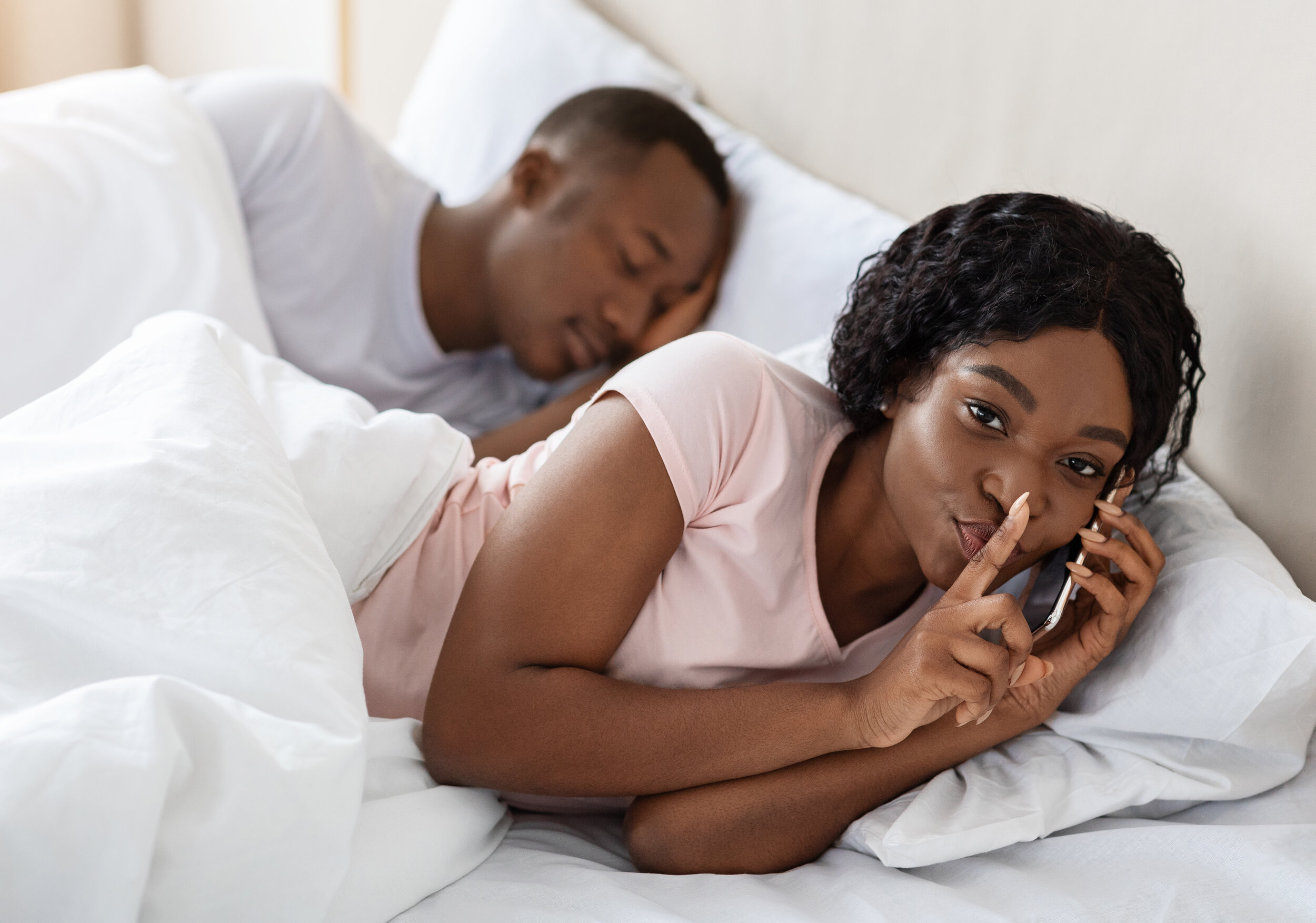 woman-cheating-on-her-husband-talking-with-lover-o-a9srj73.jpg