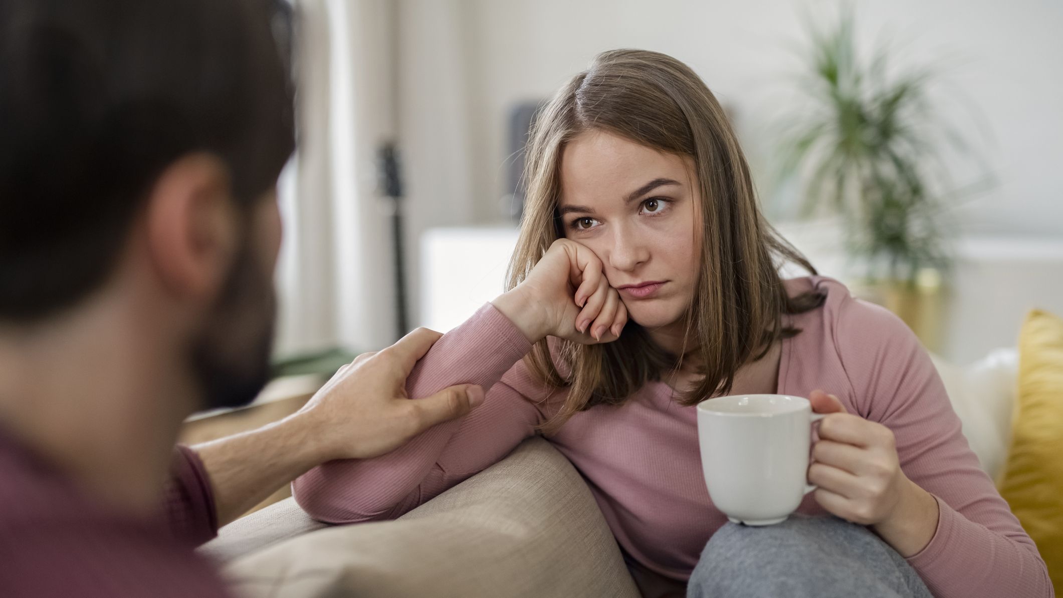 upset-young-adults-flatmates-sitting-indoors-and-royalty-free-image-1631655396.jpg