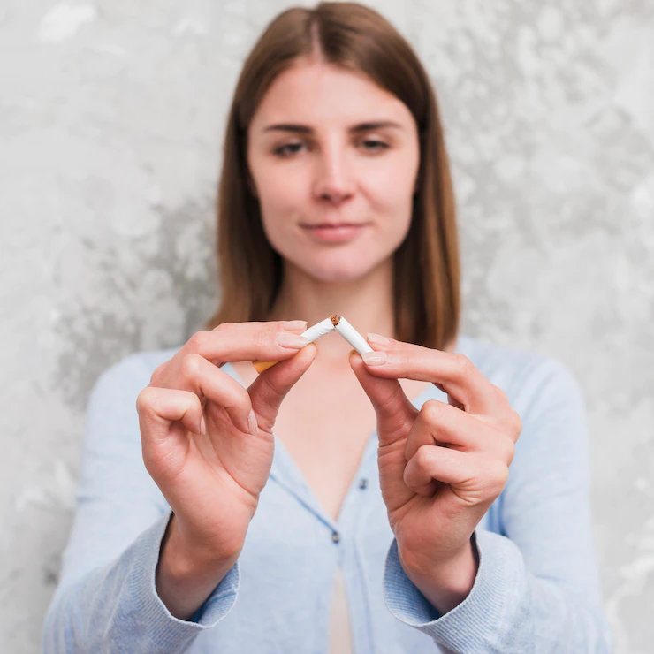 portrait-young-woman-breaking-cigarette-23-2148185348.webp