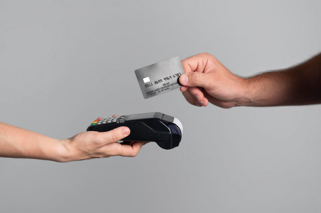man-using-his-credit-card-pay-product-23-2149107961.webp