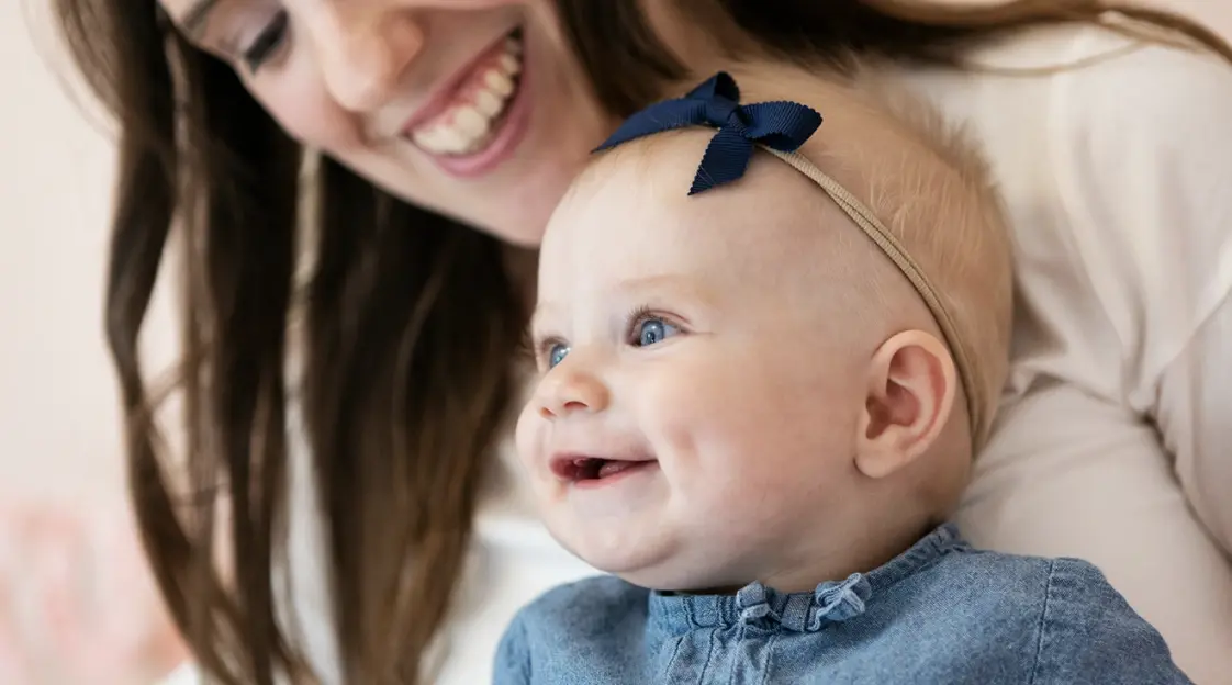 when-do-babies-start-smiling-hero-stocksy-2110617.webp