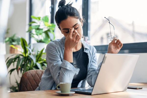 shot-stressed-business-woman-working-600nw-2296399195.webp