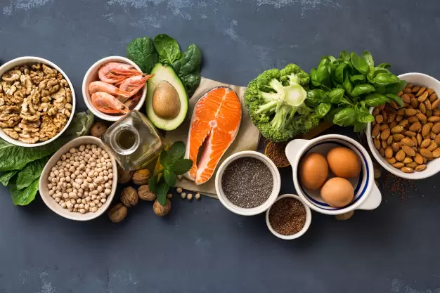 health-food-fitness-food-sources-omega-3-dark-background-top-view-foods-high-fatty-acids-including-vegetables-seafood-nut-seeds-118925-1411-jpeg.webp
